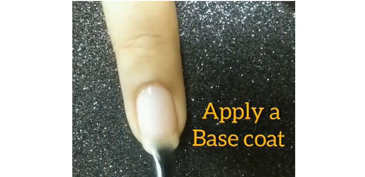 Sunflower Nail Designs: Step 1, first, prep your nails with a base coat
