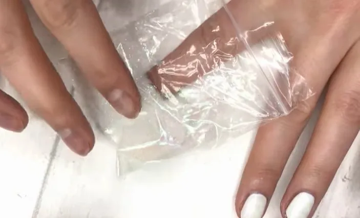 Glitter Gel Nail Polish: Step 3, pop your finger into the bag of glitter before tapping off any excess