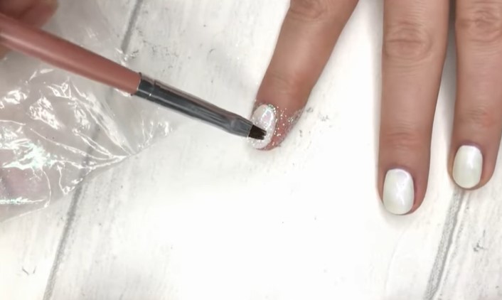 Glitter Gel Nail Polish: Step 4, buff the glitter into your nail with a small nail art brush using circular motions