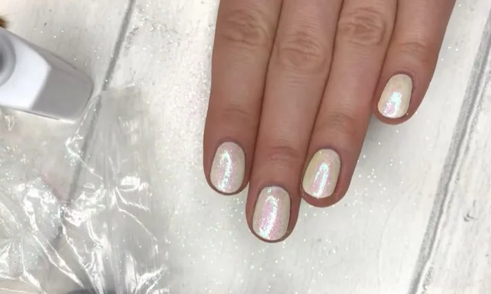 Glitter Gel Nail Polish: Step 5, remove excess glitter with a fan brush
