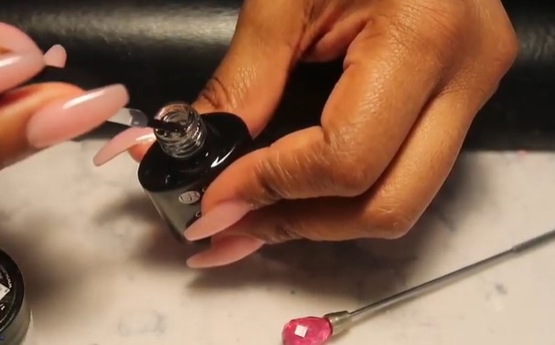 Glow In The Dark Gel Nail Polish: Step 1, the ball bearings will help the glow powder mix better with the polish