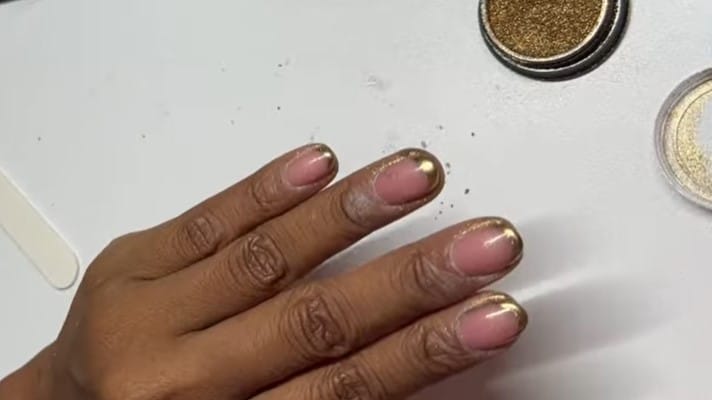 Gold French Manicure: Step 5, then apply a thin layer of gold lacquer at the tips
