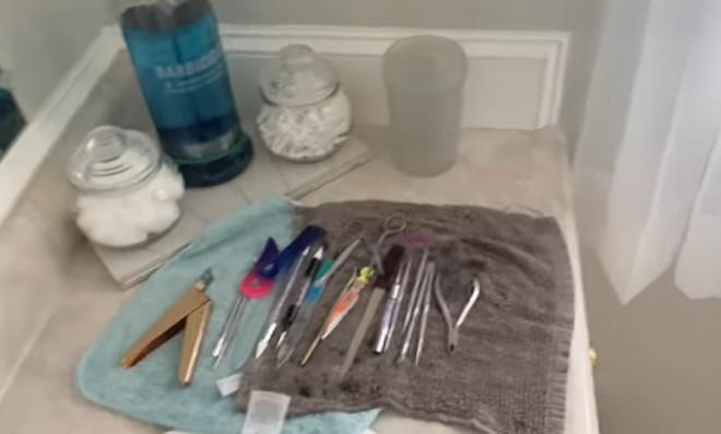 How To Clean Nail Tools With Barbicide: Step 5, put tools on a paper towel and let them dry, then store in a clean container
