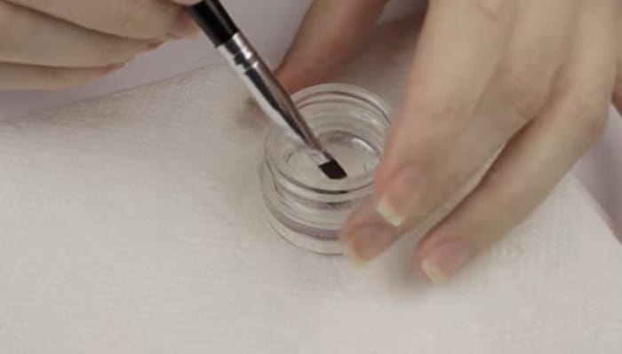 How To Clean Your Nail Brush: Step 2, soak your brushes in a dish of monomer
